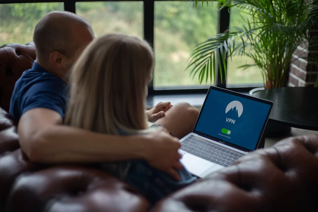 Parents reviewing 2FA mistakes on a laptop and asking why was i sent a verification code for a child’s account