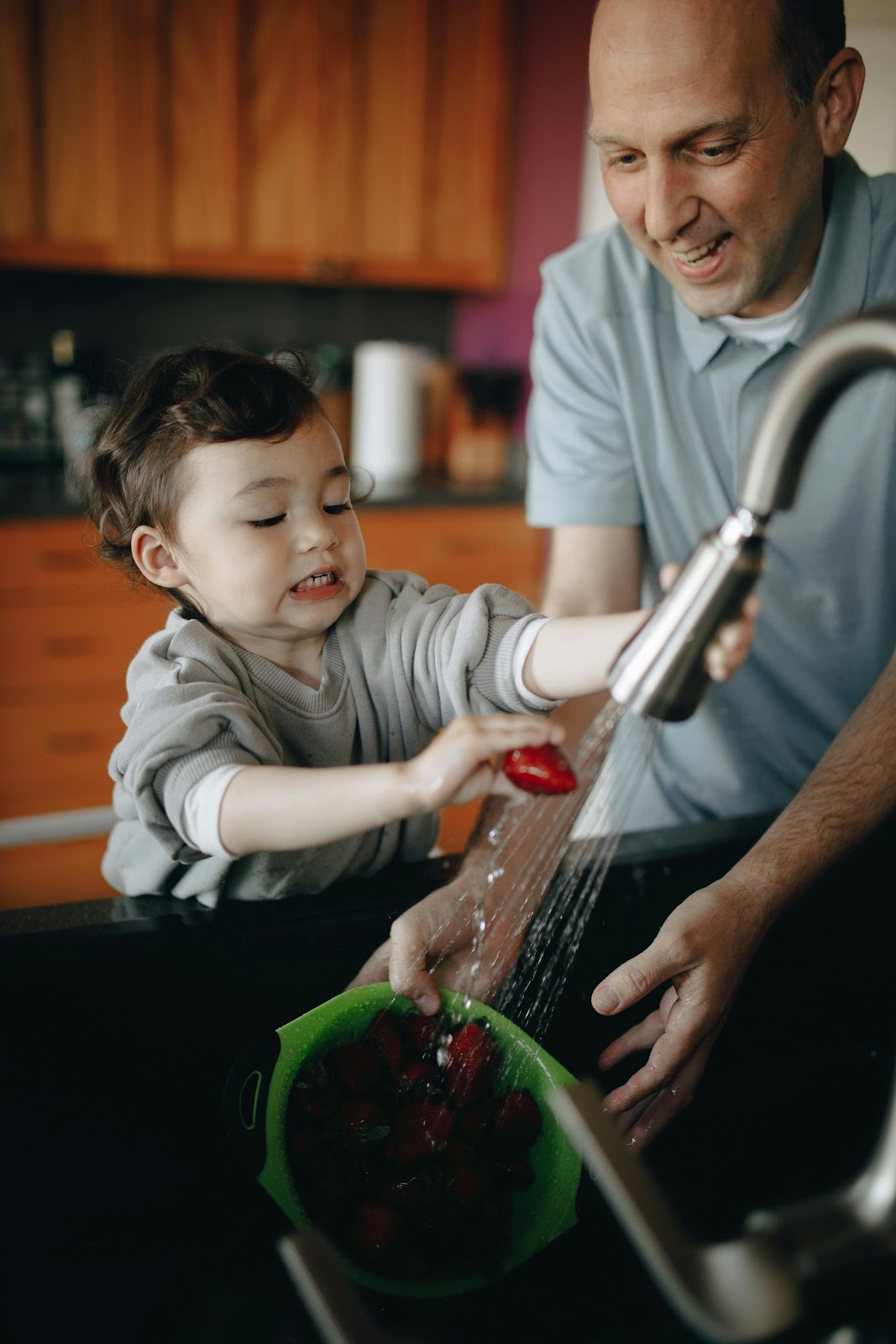 father-and-son-bonding-over-dishwashing-in-modern-kitchen